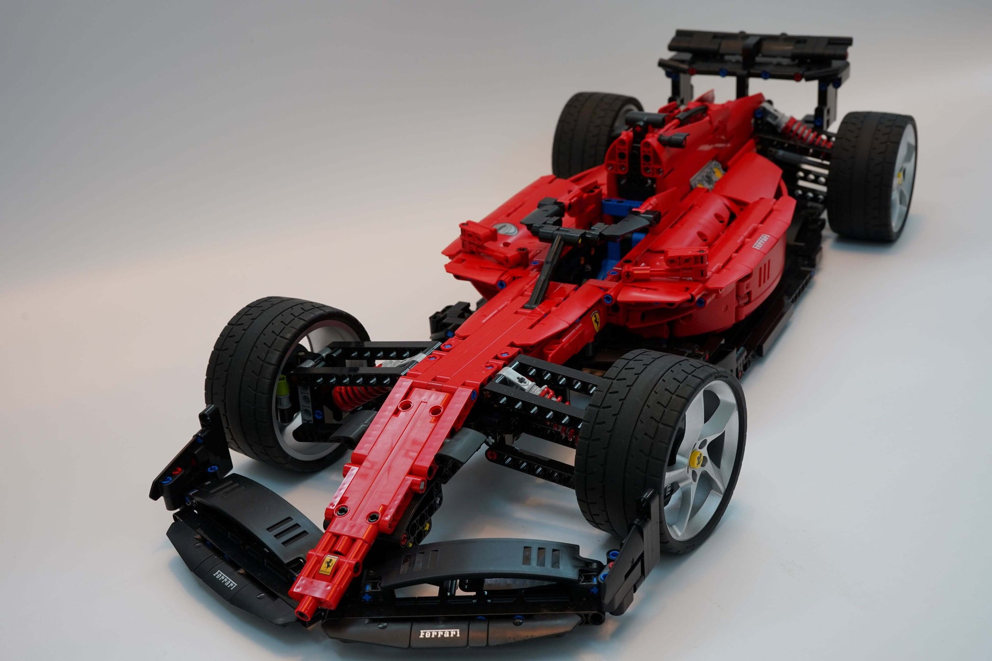 Alternative build instructions for LEGO Technic 42143:Transform your Ferrari Daytona SP3 kit into a F1 - WW Bricks Studio Official Store