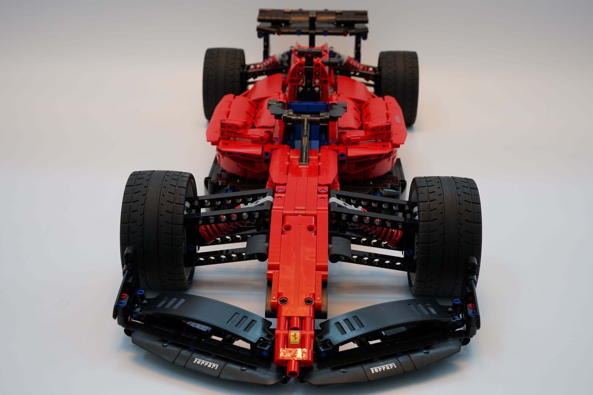 Alternative build instructions for LEGO Technic 42143:Transform your Ferrari Daytona SP3 kit into a F1 - WW Bricks Studio Official Store