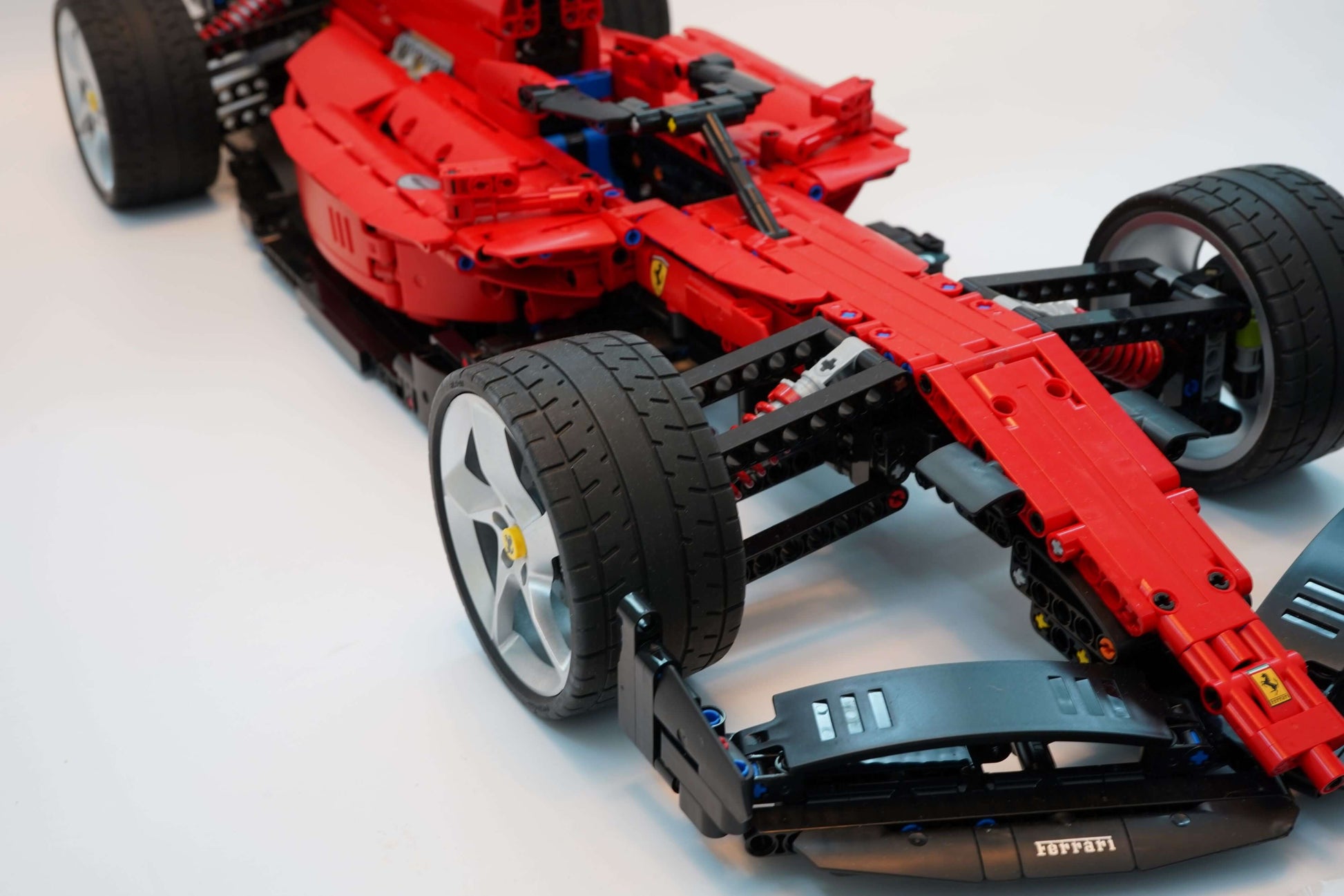 Alternative build instructions for LEGO Technic 42143:Transform your Ferrari Daytona SP3 kit into a F1 - WW Bricks Studio Official Store