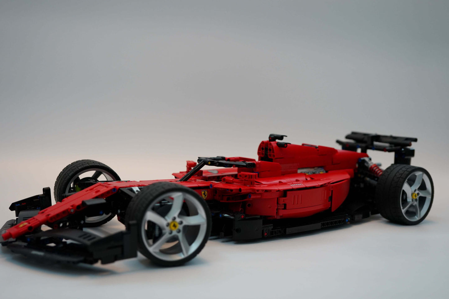 Alternative build instructions for LEGO Technic 42143：Transform your Ferrari Daytona SP3 kit into a F1 - WW Bricks Studio Official Store