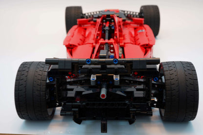 Alternative build instructions for LEGO Technic 42143：Transform your Ferrari Daytona SP3 kit into a F1 - WW Bricks Studio Official Store