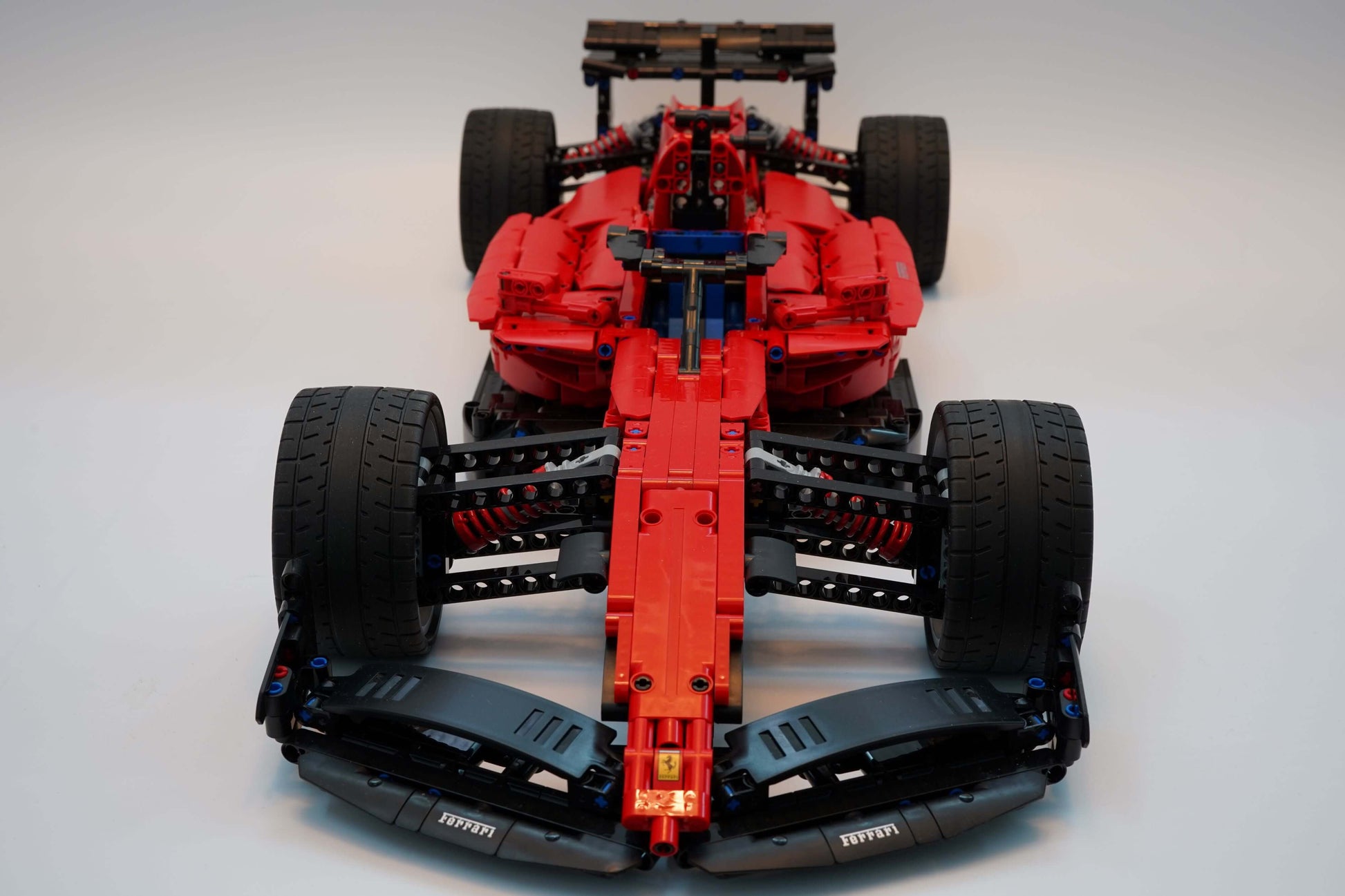 Alternative build instructions for LEGO Technic 42143：Transform your Ferrari Daytona SP3 kit into a F1 - WW Bricks Studio Official Store